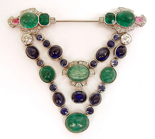 French platinum, emerald, diamond and sapphire jabot pin. Stephenson's Auctioneers image.